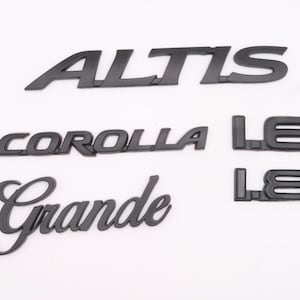 Toyota corolla matt black emblem logo