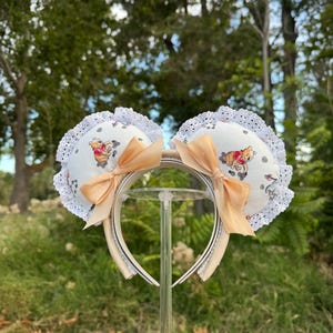 Orecchie Disney di Winnie the Pooh / Cerchietto di Winnie the Pooh / Orecchie del parco Disney / Orecchie Disney luminose