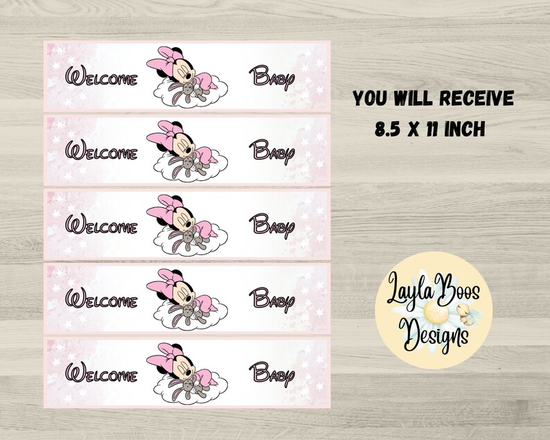 May include: Pink and white baby shower banner with Minnie Mouse illustrations. The banner reads "Welcome Baby" and includes the text "You will receive 8.5 x 11 inch". The design features a light pink background with white stars.
