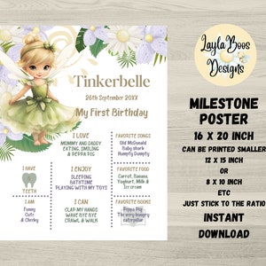 May include: A printable milestone poster featuring a green fairy illustration with the text "Tinkerbelle" and "My First Birthday". The poster includes sections for "I Love", "I Enjoy", "I Have", "I Am", and "I Can". The poster also includes information about the size and how to print it.