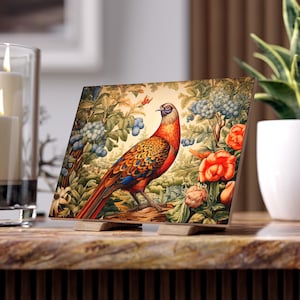 May include: A colorful painting of a pheasant standing in a garden with flowers and berries. The pheasant has orange, yellow, and blue feathers. The background is a lush green with red and blue flowers.