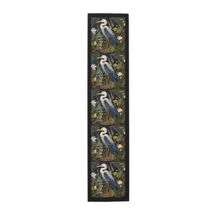 A William Morris inspired table runner featuring the graceful heron (or egret). This elegant piece brings botanical wildlife art to life, perfect for elevating your table setting and enhancing your dining room decor with nature-inspired design.
