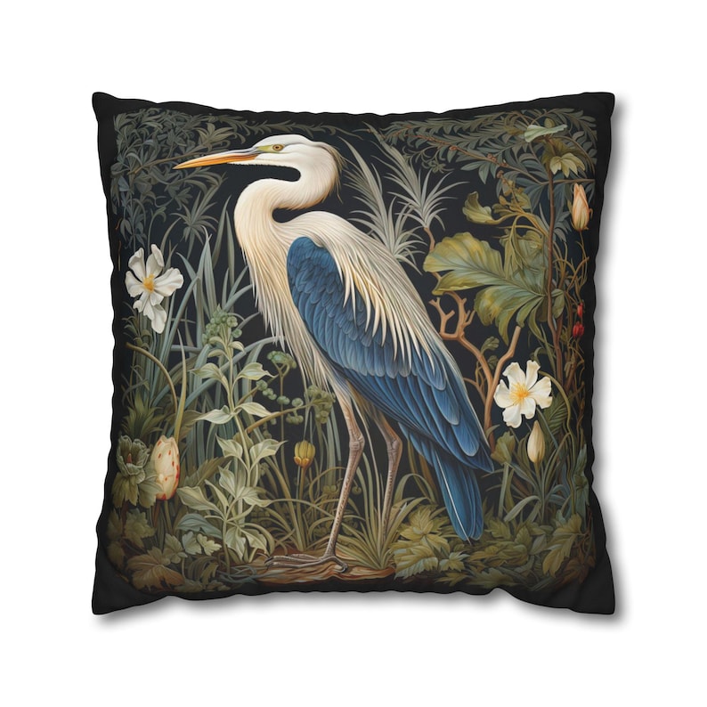 A William Morris inspired pillow featuring a Heron, perfect for Victorian and botanical decor. This decorative cushion fits beautifully on a couch, bed, or armchair, adding a touch of natural elegance and charm to indoor settings.