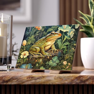 May include: A green frog with brown spots sits on a rock surrounded by green foliage and white flowers. The frog has large, black eyes and a wide mouth. The background is a lush, green forest.