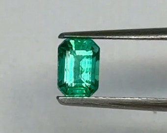 Natural emerald 0.6 carats top quality .  5.8x4.2 Emerald cut.  Zambian emerald minor oil  AAA quality clean emerald metallic green emerald