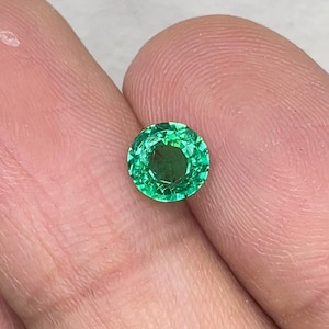 Fine natural emerald round 0.7 carat 5.9x3.4 mm height High Luster emerald  high quality emerald Zambian emerald minor oil emerald