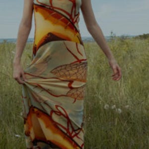 Vestido de noche de punto multicolor con estampado y espalda descubierta de Jean Paul Gaultier, talla S/M