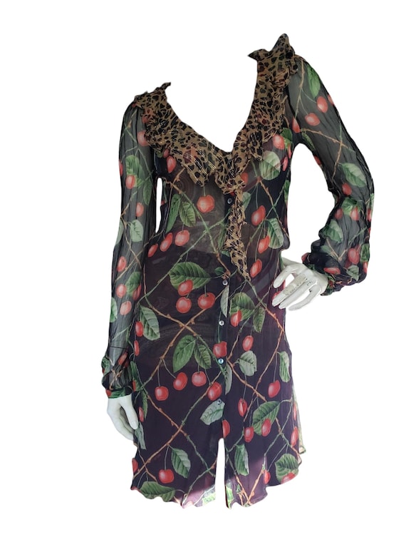 john galliano silk dress Paris Ready to Wear Autumn Winter Model wearing a green flolength a fish tail skirt and kimono style Stock Photo and clean bodice seaming that creates an elongated silhouette John Galliano Silk Dress with