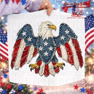 May include: A fabric design of an American bald eagle, incorporating the colours of the American flag. The eagle's wings are spread, with denim and fabric details. The design includes the text "Space Svg Studio" and "Original Designer".