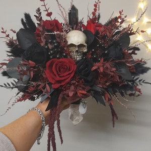 Red and Black Gothic Skull Healing Crystal Handled Bouquet. With Red and Black Roses, Trailing Amaranthus and Preserved Eucalyptus.