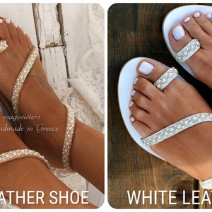 May include: Two pairs of women's sandals with a toe ring and ankle strap. The sandals are decorated with white pearls and are available in natural leather and white leather. The sandals are handmade in Greece.