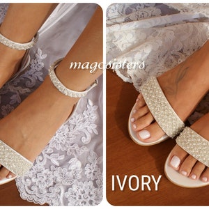 May include: Two pairs of bridal sandals with pearl embellishments. The sandals are shown in white and ivory.