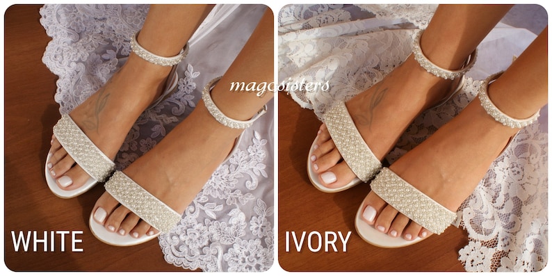 May include: Two pairs of bridal sandals with pearl embellishments. The sandals are shown in white and ivory.