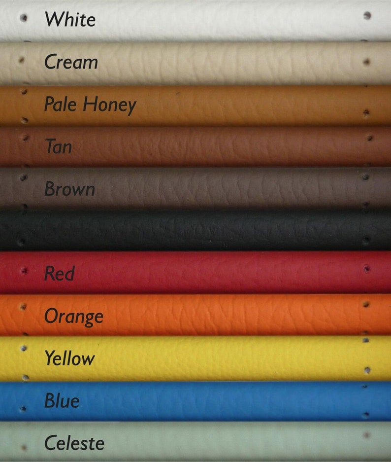 May include: A close-up of 11 different colored leather straps. The colors are white, cream, pale honey, tan, brown, black, red, orange, yellow, blue, and celeste.