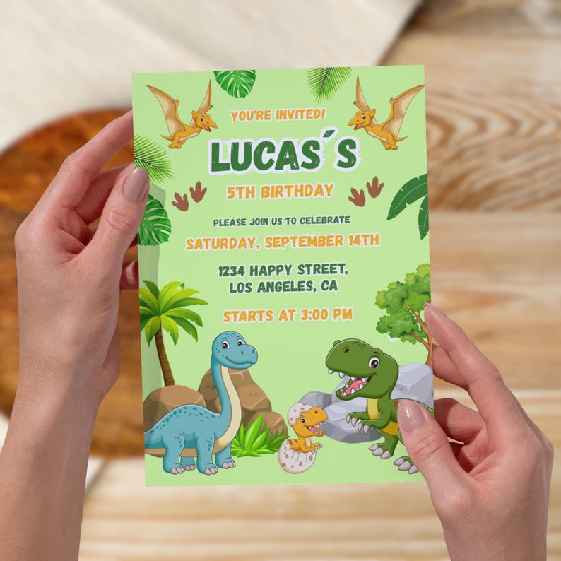 May include: A green birthday invitation with the text "YOU'RE INVITED! LUCAS'S 5TH BIRTHDAY" and event details. The invitation features cartoon dinosaurs, palm trees, and a pterodactyl illustration.