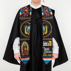 May include: A black graduation stole with vibrant floral and geometric patterns. The stole features the text "Class of 2026", space for a name and school name, and an image of the Virgin Mary. The stole also has the Ecuadorian coat of arms.