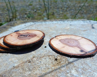 4x raw wood coasters, completely handmade. All of our items are customizable!