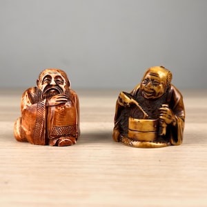 2 signed Japanese netsuke fisherman fish & rakan sage antler staghorn carving Japan Meiji Taisho antique figurine pair collector's item