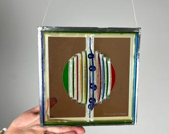 Richard Wilhelm glass appliqué “Homage to our Earth” GDR – antique colored glass on crystal, stainless steel frame, signed wall art, 18.5 cm