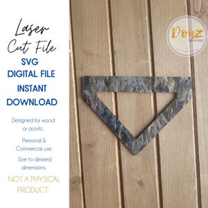 May include: A digital download SVG file for a geometric shape with a wood grain pattern. The shape is a triangle with a square cut out of the center. The text "Laser Cut File" and "SVG Digital File Instant Download" is on the left side of the image. The text "Donz Creationz" is on the right side of the image.