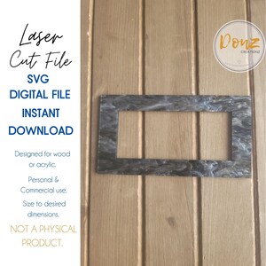 Puede incluir: Un archivo SVG descargable digitalmente para un marco cortado con láser con un diseño de mármol. El marco está diseñado para madera o acrílico y se puede dimensionar a las dimensiones deseadas. El texto "Donz Creationz" es visible en la esquina superior derecha de la imagen.