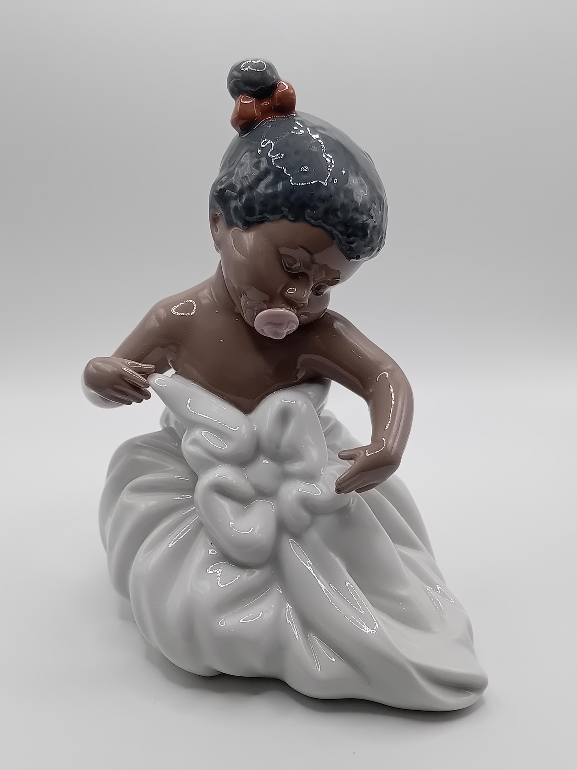 リヤドロ Nao by Lladro All Bundled Up Nao by Lladro. All Bundled Up. No 1340 - Etsy