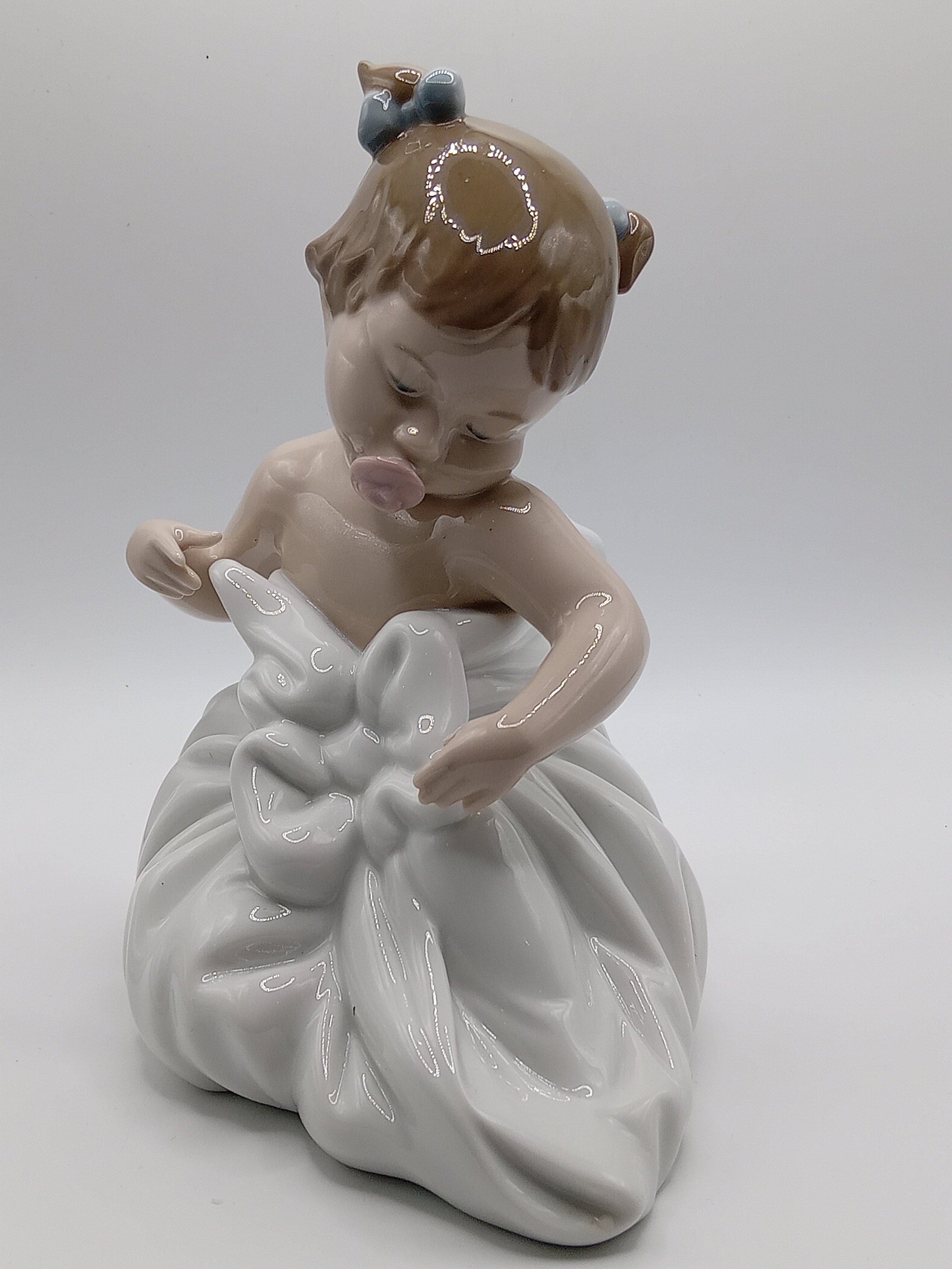 Nao by Lladro. 