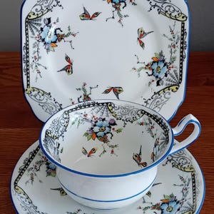 Vintage Fenton Bone China Teacup trio in the WEB pattern.