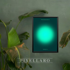 May include: A framed poster with a teal green background and a bright green circle in the center. The text on the poster reads "I will grow through the people I meet and the places I go."