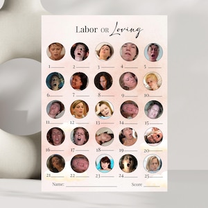 Op de afbeelding: Een roze en witte spelkaart met de tekst "Labor or Loving" en een reeks genummerde cirkels met afbeeldingen van gezichtsuitdrukkingen. De kaart bevat ruimtes voor een naam en score.
