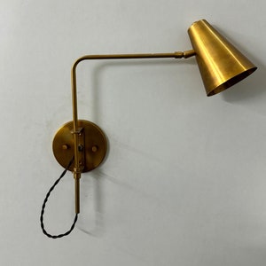 Radiant Elegance Handcrafted Raw Brass Wall Lamp with Chic Single Arm