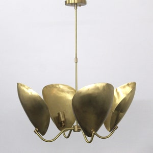 Graceful Elegance The Enchanting Curves of Brass Chandelier