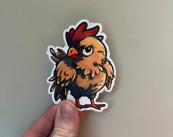 May include: A cartoon rooster sticker with a red comb and wattle, brown and yellow feathers, and black eyes. The rooster is looking to the left and has its wings spread out.