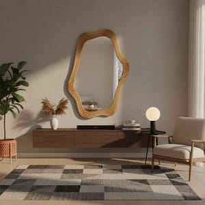 May include: A set of three ceramic mugs with a speckled, matte finish. The mugs are in shades of cream, light brown, and dark brown. Each mug has a simple, minimalist design, perfect for coffee or tea.