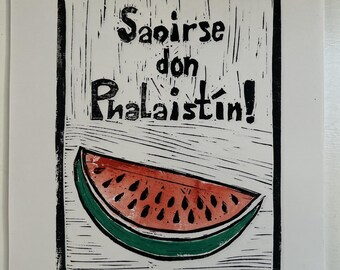 May include: A black and white linocut print featuring a watermelon slice with red flesh and green rind. The print includes the text "Sairse don Phalaistín!" in a bold, handwritten style, set against a white background.