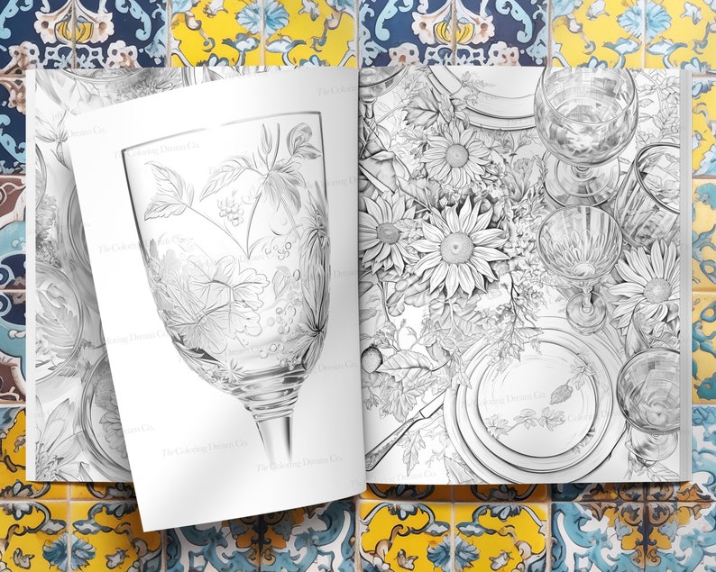 May include: A black and white illustration of a table setting with sunflowers, plates, and glasses. The illustration is drawn in a realistic style.