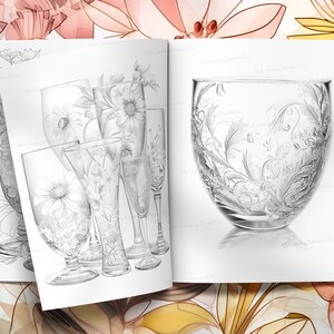 May include: A black and white illustration of a set of five etched glass goblets with floral designs. The goblets are arranged in a row, with the largest goblet in the center. The goblets are all different shapes and sizes.