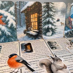 May include: A set of winter-themed art cards with illustrations of a cabin, animals, and snowy landscapes. The cards feature text and images of a bullfinch, squirrel, and rabbit. The colour palette includes white, blue, and orange.