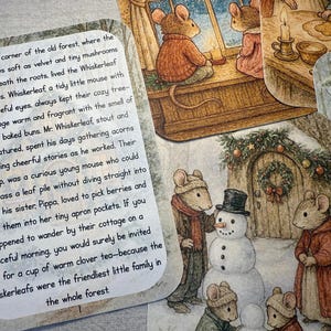 May include: A collection of illustrated cards featuring mice in a forest setting. One card has text describing the Whiskerleaf family. Other cards show mice near a window, baking, and building a snowman. The illustrations have a warm, inviting feel.