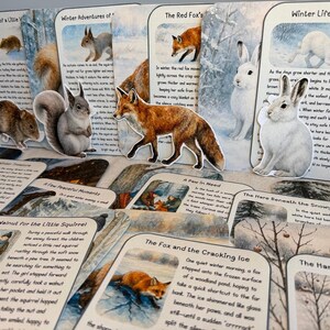 May include: A selection of illustrated cards depicting winter scenes with animals like foxes, squirrels, and hares. Each card has a title and text, forming a narrative. The cards are displayed on a light surface.