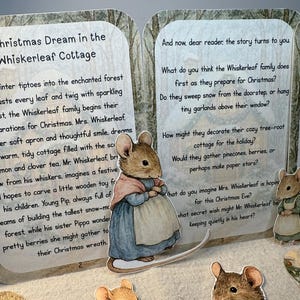 May include: A Christmas-themed children's book spread open, featuring illustrations of mice and text. The text describes the Whiskerleaf family's Christmas preparations. The illustrations include a mouse wearing a dress and apron.