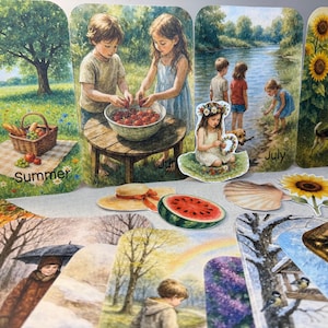 May include: A collection of seasonal art cards featuring children in various outdoor settings. Scenes include a picnic, children by a river, sunflowers, and a winter scene. Additional elements include a watermelon slice and a seashell.