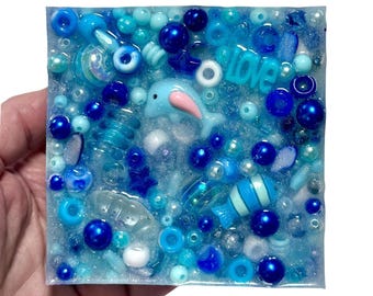 Shimmering Sea Blue Picky Pad: Silicone Fidget Toy, Skin Picking Alternative, Anxiety Relief, ADHD Focus, ASMR Toy - with Hidden Treasure!