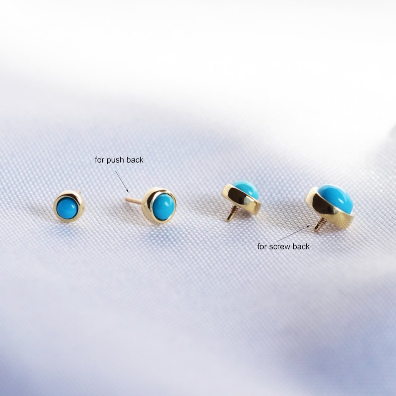 May include: Three turquoise gemstone earrings with gold settings. The earrings on the left and right have a push back closure. The earring in the middle has a screw back closure.