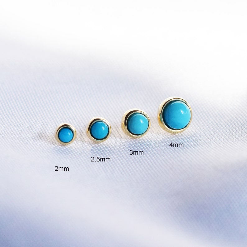 May include: Four turquoise gemstone earrings in gold settings, shown in increasing size from left to right: 2mm, 2.5mm, 3mm, and 4mm.