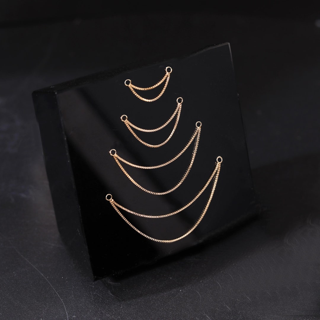 美品】アデルビジューのCUTSTEEL double chain pierce 美品】アデル