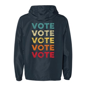 Pace e voto: giacca a vento colorata VOTE con segno di pace immagine 1