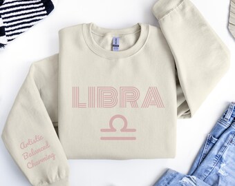 Spersonalizowana bluza z motywem Wagi to idealny prezent na urodziny we wrześniu/październiku; Spersonalizowana koszulka z motywem znaku zodiaku Wagi to wyjątkowy prezent świąteczny