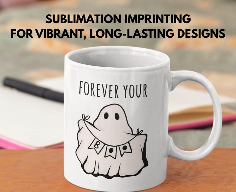 May include: White ceramic mug with a black ghost illustration holding a banner that says "B A E". The mug has the words "FOREVER YOUR" above the ghost. The text "SUBLIMATION IMPRINTING FOR VIBRANT, LONG-LASTING DESIGNS" is at the top.