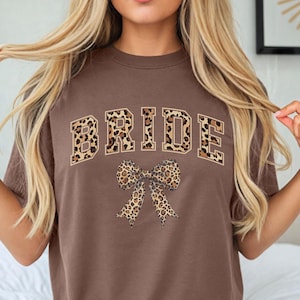Leopard Print Coquette Comfort Colors Bride Shirt; Animal Print Bow Wedding T-shirt; Fun, Casual Honeymoon or Bachelorette Shirt for Her